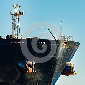 Black cargo ship`s bow