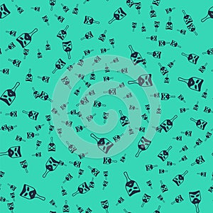 Black Carnival mask icon isolated seamless pattern on green background. Masquerade party mask. Vector