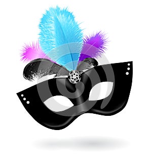 Black carnival mask with pink, blue, black feathers on white background