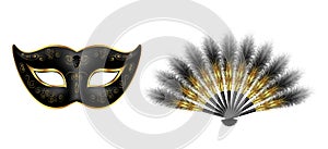 Black carnival venetian mask, masquerade feather fan with gold ornament