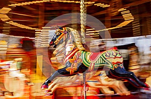 Black Carousel Horse Motion Blur