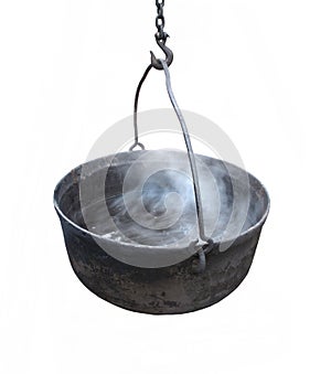 Black cast iron kettle isolated.