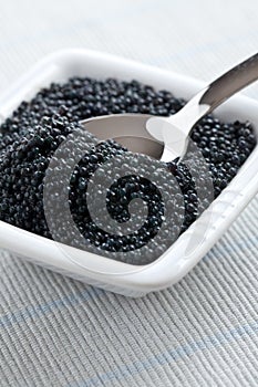 Black caviar in bowl