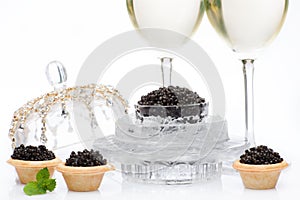 Black caviar and champagne isolated photo