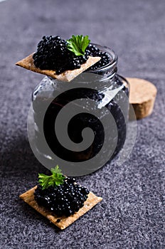 Black caviar on a cracker