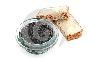Black caviar in a jar and bread
