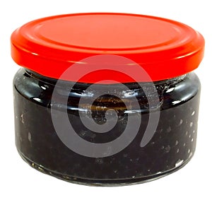 Black caviar in a jar with a lid
