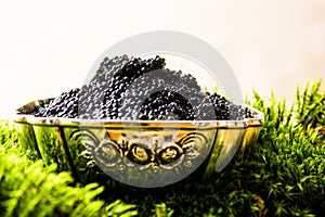 Black caviar, luxurious delicacy appetizer.