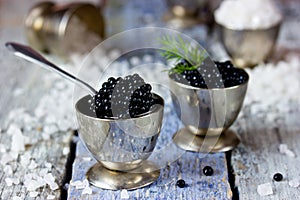 Black caviar, luxurious delicacy appetizer. Selective focus