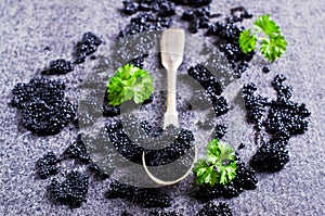 Black caviar in the spoon