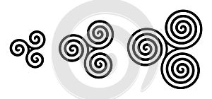 Black Celtic triskelion spirals over white photo