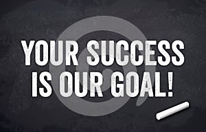 Black chalkboard with message Your success is our goal