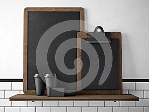 Black chalkboard on bookshelf with two blank coffee cups, businesscards and empty desk. 3d rendering