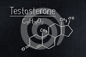Black chalkboard with the chemical formula of testosterone