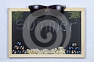 Black chalkboard with wooden frame.