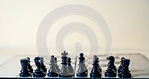 Black chess figures with king and queen in the center isolated on the white background. Set of chess figures