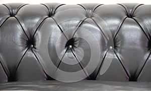 Black chesterfield leather sofa