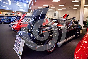 Black 1966 Chevrolet Corvette Sting Ray displayed at the Muscle Car City museum