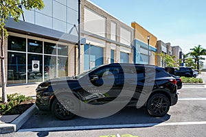Black Chevy Blazer SUV in a parking lot