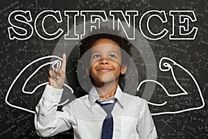 Black child smart student boy pointing at Science inscription