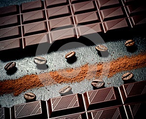 Black chocolate bar, coffee beans, cocoa powder