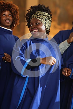 Black Christian Female Gospel Singer Singing, Happy to be Spreading the Love of Lord Jesus Christ