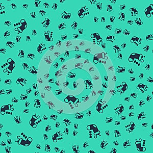 Black Christmas stocking icon isolated seamless pattern on green background. Merry Christmas and Happy New Year. Vector