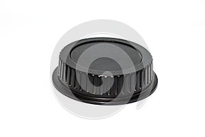 Black circle camera len cap on white background