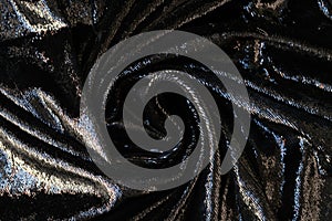 Black cloth with shiny coating abstract background