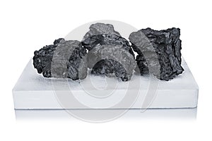 Black coal and white firelighter
