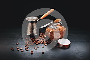 black coffee, beans, instant fast on a background, with the Turks for brewing and the glass jar of quickly