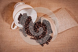 Black coffee beans in a sack