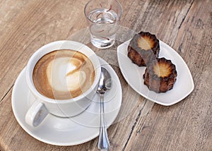 Black coffee with canele dessert