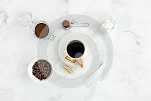 Black Coffee, Cantucci, Cup, Sugar, Ground Coffee and Beans