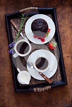 Black Coffee and chocolate muffins for breakfast