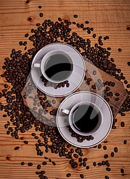 Black coffee with coffee beans