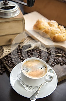 Black coffee with coffee beans an whirlybird photo