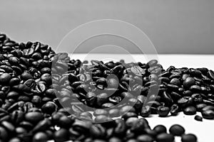 Black coffee cup, coffee beans. Breakfast coffee concept