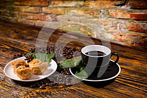 Black Coffee with Gourmet Pastries and Mint