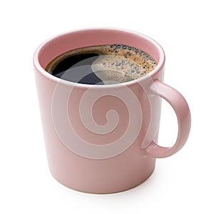 Black coffee in a pink ceramic mug isolated on white