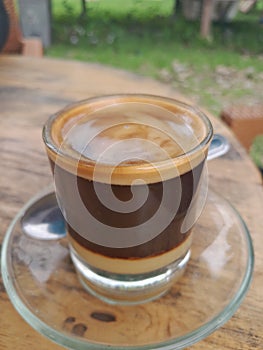 black coffee with smoot milk photo