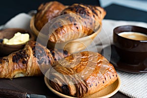 Black coffee and sweet pastries breakfast