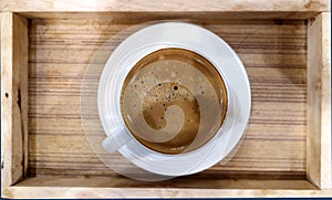 Black coffee in a white ceramic mug