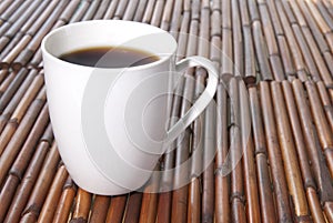Black coffee in a white cup photo