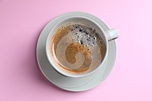 Black coffee white cup isolated on pink background