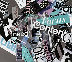 Black collage of words on a mood board. bright atmospheric background of words and letters cut out from a magazine.