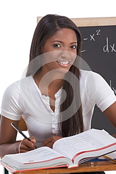 Black college student woman studying math exam