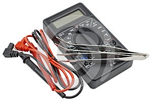 Black color digital multimeter and pincette