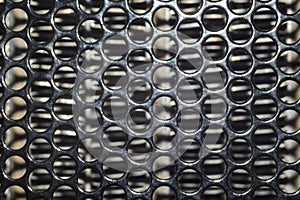 Black color mesh background. Metal steel greed.
