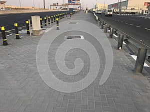 Black color with yellow fluorescent warning safety reflector poles fixed over roadside interlocks